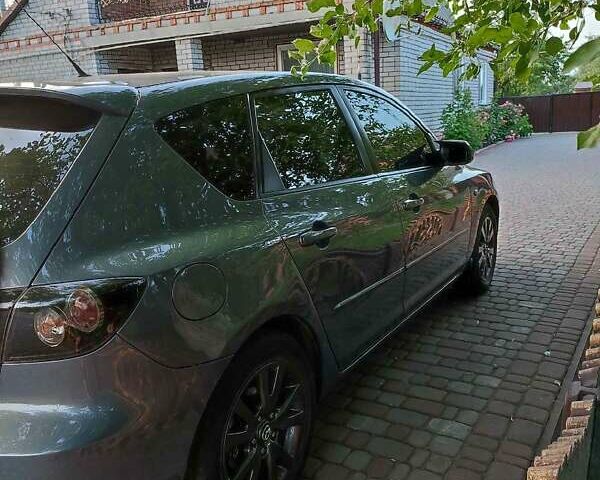 Серый Мазда 3, объемом двигателя 1.6 л и пробегом 213 тыс. км за 5500 $, фото 1 на Automoto.ua
