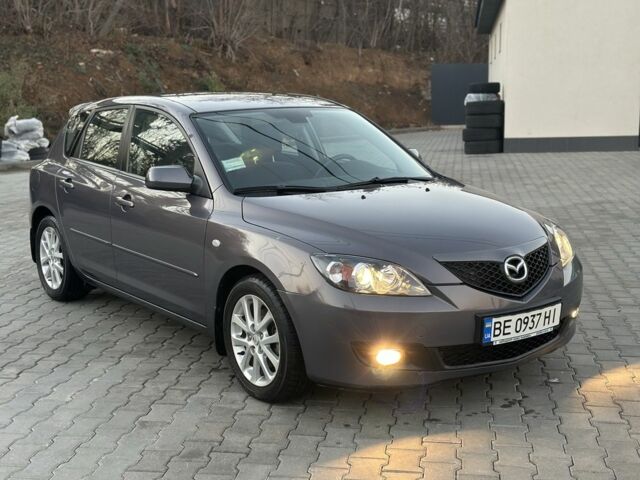 Серый Мазда 3, объемом двигателя 1.6 л и пробегом 59 тыс. км за 7000 $, фото 1 на Automoto.ua