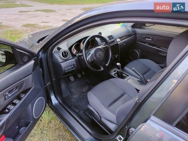 Серый Мазда 3, объемом двигателя 1.6 л и пробегом 193 тыс. км за 6000 $, фото 3 на Automoto.ua