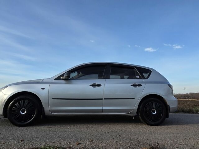 Серый Мазда 3, объемом двигателя 1.3 л и пробегом 197 тыс. км за 4600 $, фото 2 на Automoto.ua