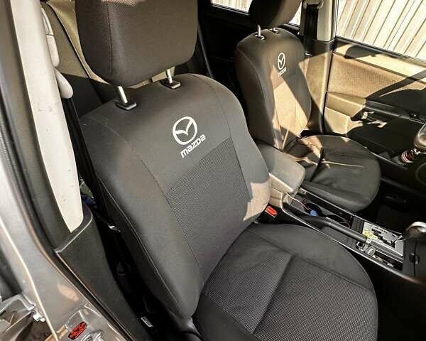 Серый Мазда 3, объемом двигателя 1.6 л и пробегом 160 тыс. км за 6000 $, фото 6 на Automoto.ua