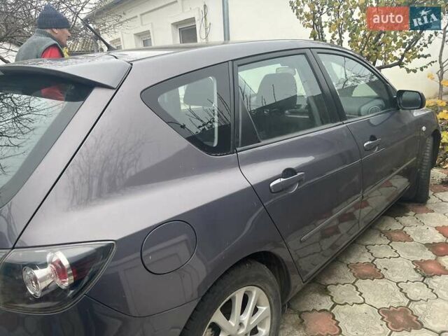 Серый Мазда 3, объемом двигателя 1.6 л и пробегом 66 тыс. км за 6500 $, фото 6 на Automoto.ua