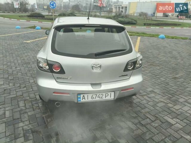 Серый Мазда 3, объемом двигателя 2 л и пробегом 250 тыс. км за 4600 $, фото 3 на Automoto.ua