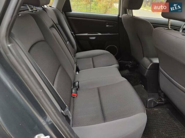 Серый Мазда 3, объемом двигателя 1.6 л и пробегом 191 тыс. км за 5500 $, фото 28 на Automoto.ua