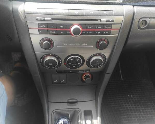 Серый Мазда 3, объемом двигателя 1.6 л и пробегом 190 тыс. км за 5800 $, фото 8 на Automoto.ua