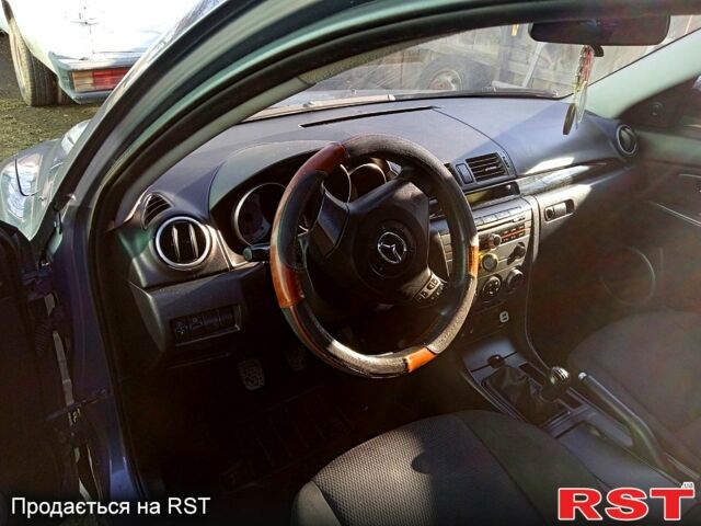 Серый Мазда 3, объемом двигателя 1.6 л и пробегом 223 тыс. км за 4800 $, фото 1 на Automoto.ua