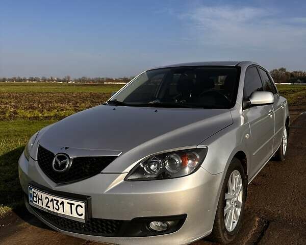 Серый Мазда 3, объемом двигателя 1.6 л и пробегом 160 тыс. км за 6000 $, фото 2 на Automoto.ua