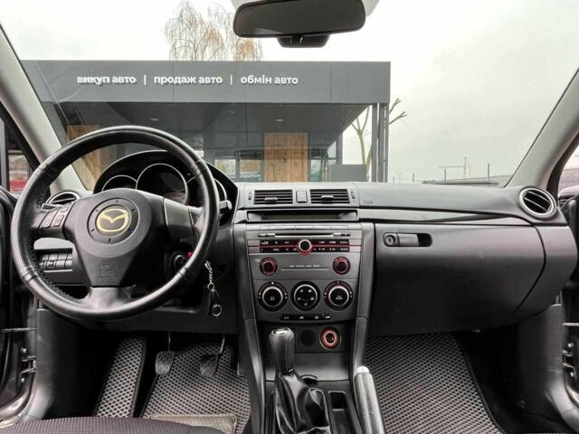 Серый Мазда 3, объемом двигателя 1.6 л и пробегом 195 тыс. км за 5699 $, фото 8 на Automoto.ua