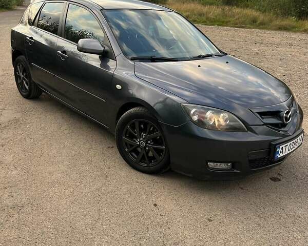 Сірий Мазда 3, об'ємом двигуна 2 л та пробігом 242 тис. км за 6700 $, фото 4 на Automoto.ua