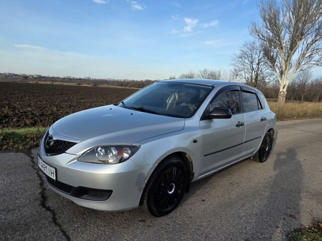 Серый Мазда 3, объемом двигателя 1.3 л и пробегом 197 тыс. км за 4600 $, фото 1 на Automoto.ua