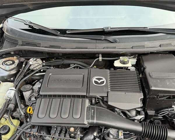 Серый Мазда 3, объемом двигателя 1.6 л и пробегом 235 тыс. км за 6200 $, фото 2 на Automoto.ua