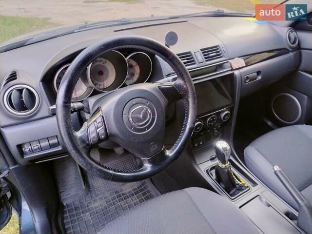 Серый Мазда 3, объемом двигателя 1.6 л и пробегом 193 тыс. км за 6000 $, фото 10 на Automoto.ua