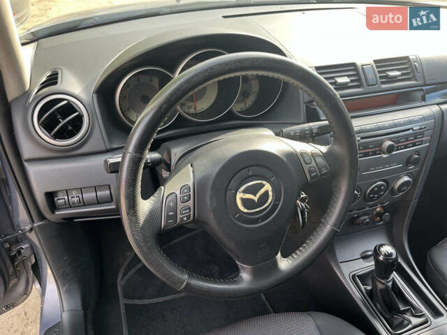 Сірий Мазда 3, об'ємом двигуна 1.6 л та пробігом 266 тис. км за 4300 $, фото 15 на Automoto.ua