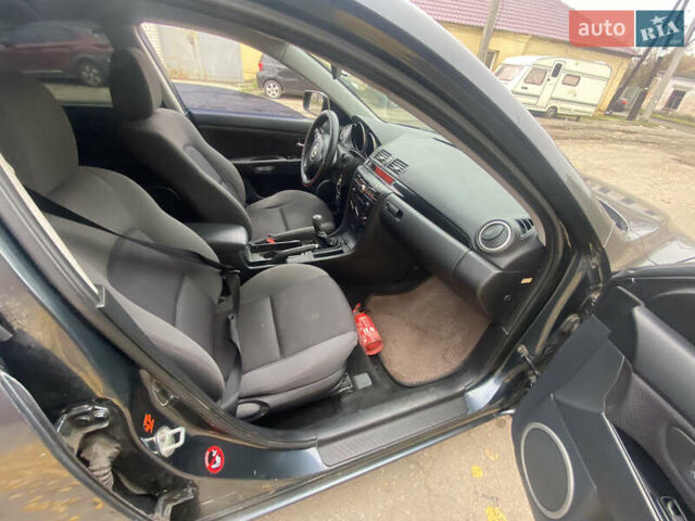 Серый Мазда 3, объемом двигателя 1.6 л и пробегом 220 тыс. км за 4200 $, фото 10 на Automoto.ua