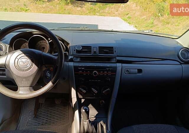 Сірий Мазда 3, об'ємом двигуна 1.3 л та пробігом 221 тис. км за 5100 $, фото 19 на Automoto.ua