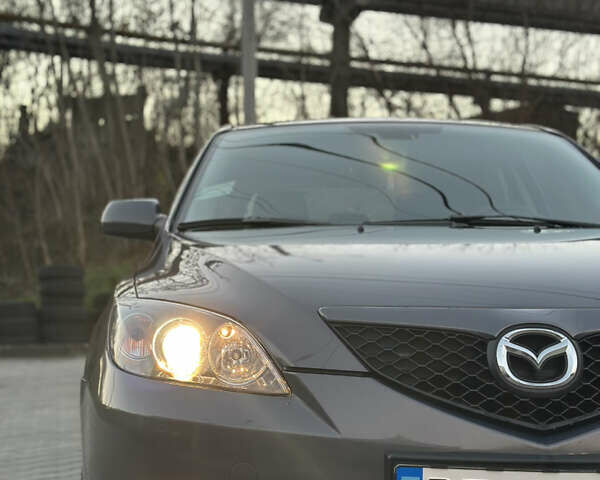 Серый Мазда 3, объемом двигателя 1.6 л и пробегом 66 тыс. км за 6999 $, фото 3 на Automoto.ua