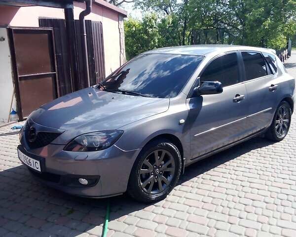 Серый Мазда 3, объемом двигателя 1.6 л и пробегом 213 тыс. км за 5500 $, фото 5 на Automoto.ua