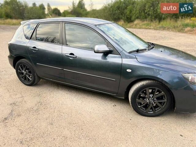 Сірий Мазда 3, об'ємом двигуна 2 л та пробігом 242 тис. км за 6700 $, фото 7 на Automoto.ua