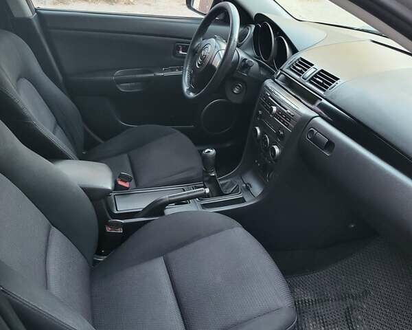 Серый Мазда 3, объемом двигателя 1.6 л и пробегом 260 тыс. км за 4700 $, фото 19 на Automoto.ua