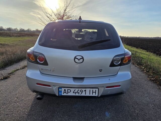 Серый Мазда 3, объемом двигателя 1.3 л и пробегом 197 тыс. км за 4600 $, фото 4 на Automoto.ua