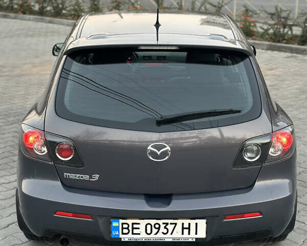 Серый Мазда 3, объемом двигателя 1.6 л и пробегом 66 тыс. км за 6999 $, фото 5 на Automoto.ua