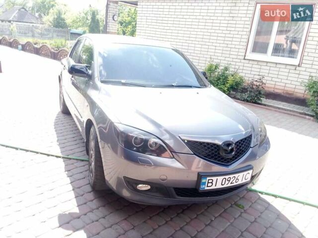 Серый Мазда 3, объемом двигателя 1.6 л и пробегом 213 тыс. км за 5500 $, фото 7 на Automoto.ua