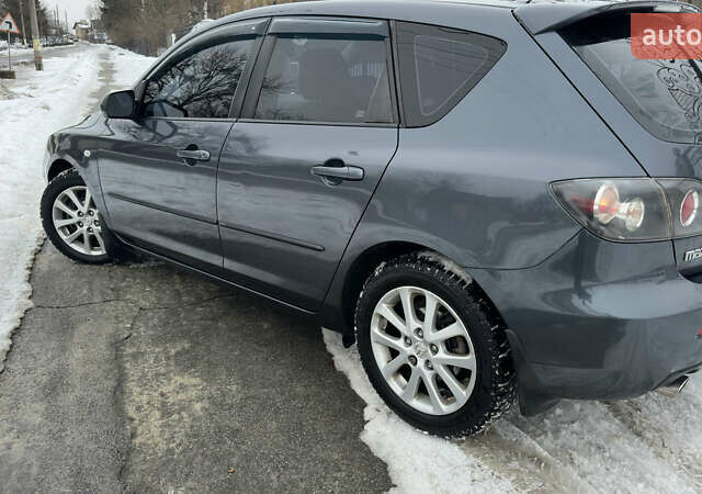 Сірий Мазда 3, об'ємом двигуна 1.6 л та пробігом 225 тис. км за 4777 $, фото 2 на Automoto.ua