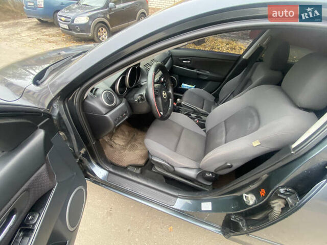 Серый Мазда 3, объемом двигателя 1.6 л и пробегом 220 тыс. км за 4200 $, фото 7 на Automoto.ua