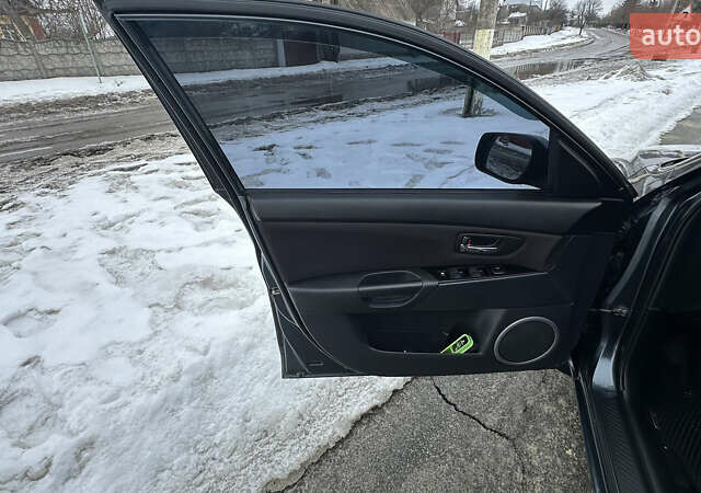 Сірий Мазда 3, об'ємом двигуна 1.6 л та пробігом 225 тис. км за 4777 $, фото 18 на Automoto.ua