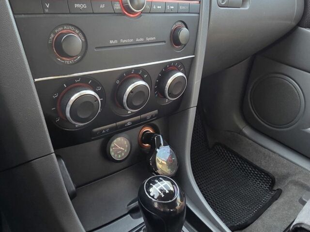 Серый Мазда 3, объемом двигателя 1.3 л и пробегом 197 тыс. км за 4600 $, фото 11 на Automoto.ua