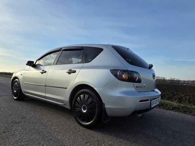 Серый Мазда 3, объемом двигателя 1.3 л и пробегом 197 тыс. км за 4600 $, фото 3 на Automoto.ua