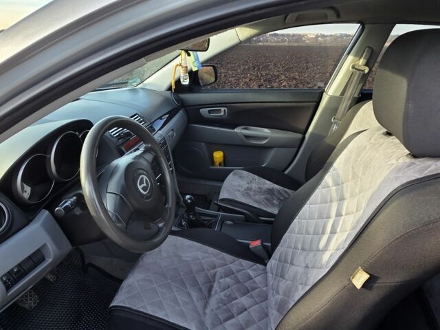 Серый Мазда 3, объемом двигателя 1.3 л и пробегом 197 тыс. км за 4600 $, фото 7 на Automoto.ua