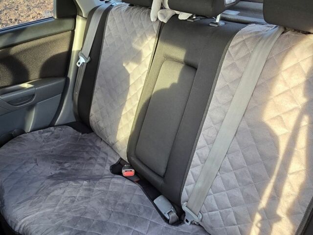 Серый Мазда 3, объемом двигателя 1.3 л и пробегом 197 тыс. км за 4600 $, фото 14 на Automoto.ua