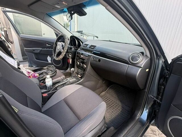Серый Мазда 3, объемом двигателя 2 л и пробегом 170 тыс. км за 5700 $, фото 7 на Automoto.ua