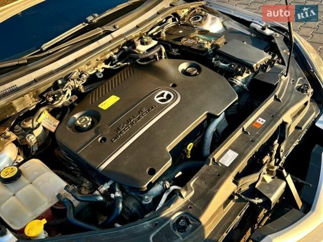 Сірий Мазда 3, об'ємом двигуна 2 л та пробігом 150 тис. км за 5900 $, фото 6 на Automoto.ua