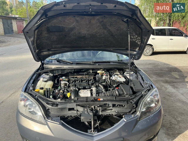 Сірий Мазда 3, об'ємом двигуна 1.6 л та пробігом 266 тис. км за 4300 $, фото 14 на Automoto.ua