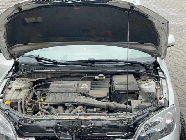 Серый Мазда 3, объемом двигателя 1.6 л и пробегом 225 тыс. км за 5700 $, фото 12 на Automoto.ua