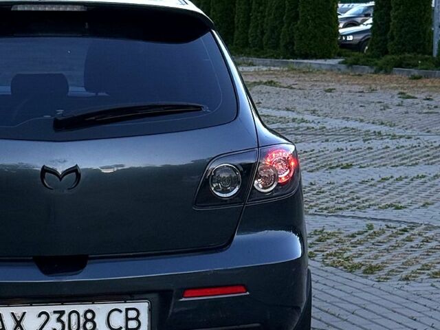 Серый Мазда 3, объемом двигателя 1.6 л и пробегом 218 тыс. км за 5500 $, фото 1 на Automoto.ua