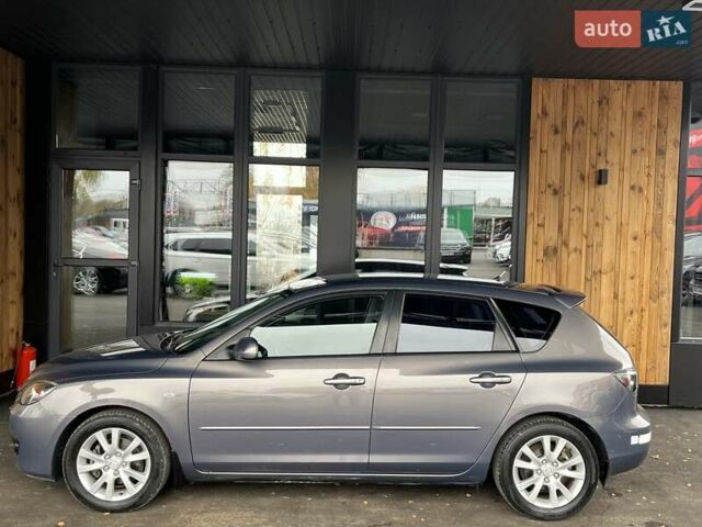 Сірий Мазда 3, об'ємом двигуна 1.6 л та пробігом 195 тис. км за 5699 $, фото 6 на Automoto.ua