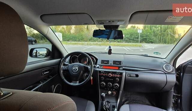 Сірий Мазда 3, об'ємом двигуна 1.6 л та пробігом 234 тис. км за 5700 $, фото 12 на Automoto.ua