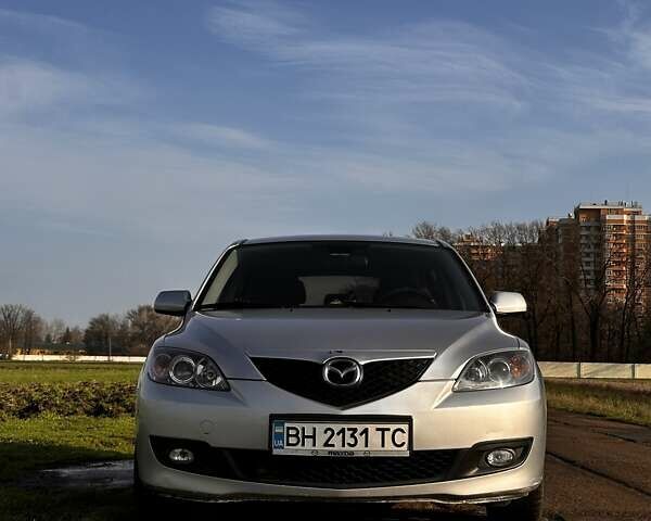 Серый Мазда 3, объемом двигателя 1.6 л и пробегом 160 тыс. км за 6000 $, фото 4 на Automoto.ua