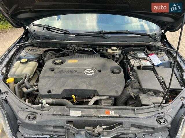 Сірий Мазда 3, об'ємом двигуна 2 л та пробігом 242 тис. км за 6700 $, фото 11 на Automoto.ua