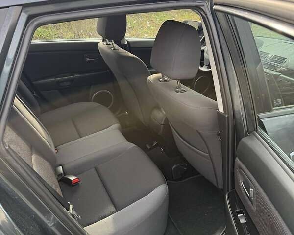 Серый Мазда 3, объемом двигателя 1.6 л и пробегом 235 тыс. км за 6200 $, фото 6 на Automoto.ua