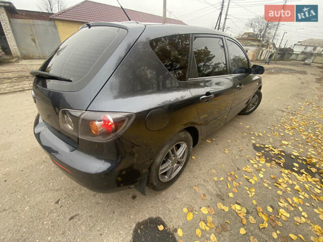 Серый Мазда 3, объемом двигателя 1.6 л и пробегом 220 тыс. км за 4200 $, фото 5 на Automoto.ua