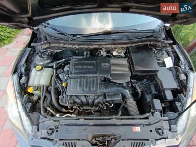 Серый Мазда 3, объемом двигателя 1.6 л и пробегом 150 тыс. км за 7850 $, фото 31 на Automoto.ua