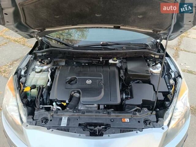 Серый Мазда 3, объемом двигателя 1.6 л и пробегом 240 тыс. км за 5999 $, фото 21 на Automoto.ua