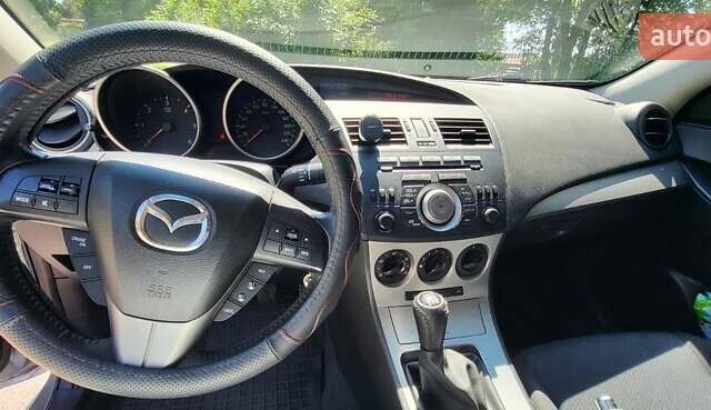 Серый Мазда 3, объемом двигателя 1.6 л и пробегом 180 тыс. км за 6900 $, фото 6 на Automoto.ua
