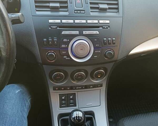 Серый Мазда 3, объемом двигателя 1.6 л и пробегом 240 тыс. км за 5999 $, фото 17 на Automoto.ua