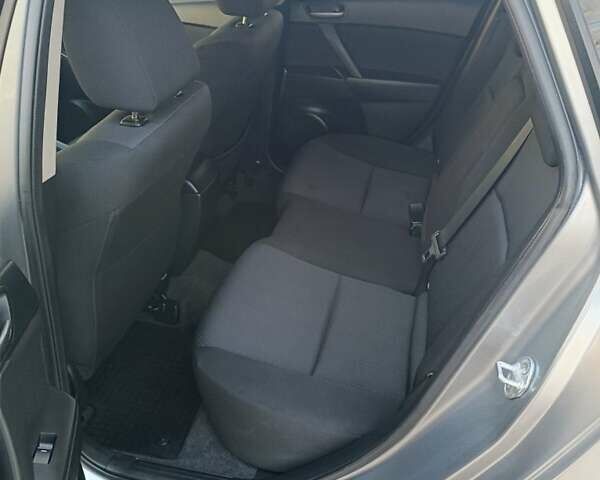 Серый Мазда 3, объемом двигателя 1.6 л и пробегом 240 тыс. км за 5999 $, фото 12 на Automoto.ua