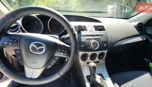 Серый Мазда 3, объемом двигателя 1.6 л и пробегом 180 тыс. км за 6900 $, фото 7 на Automoto.ua